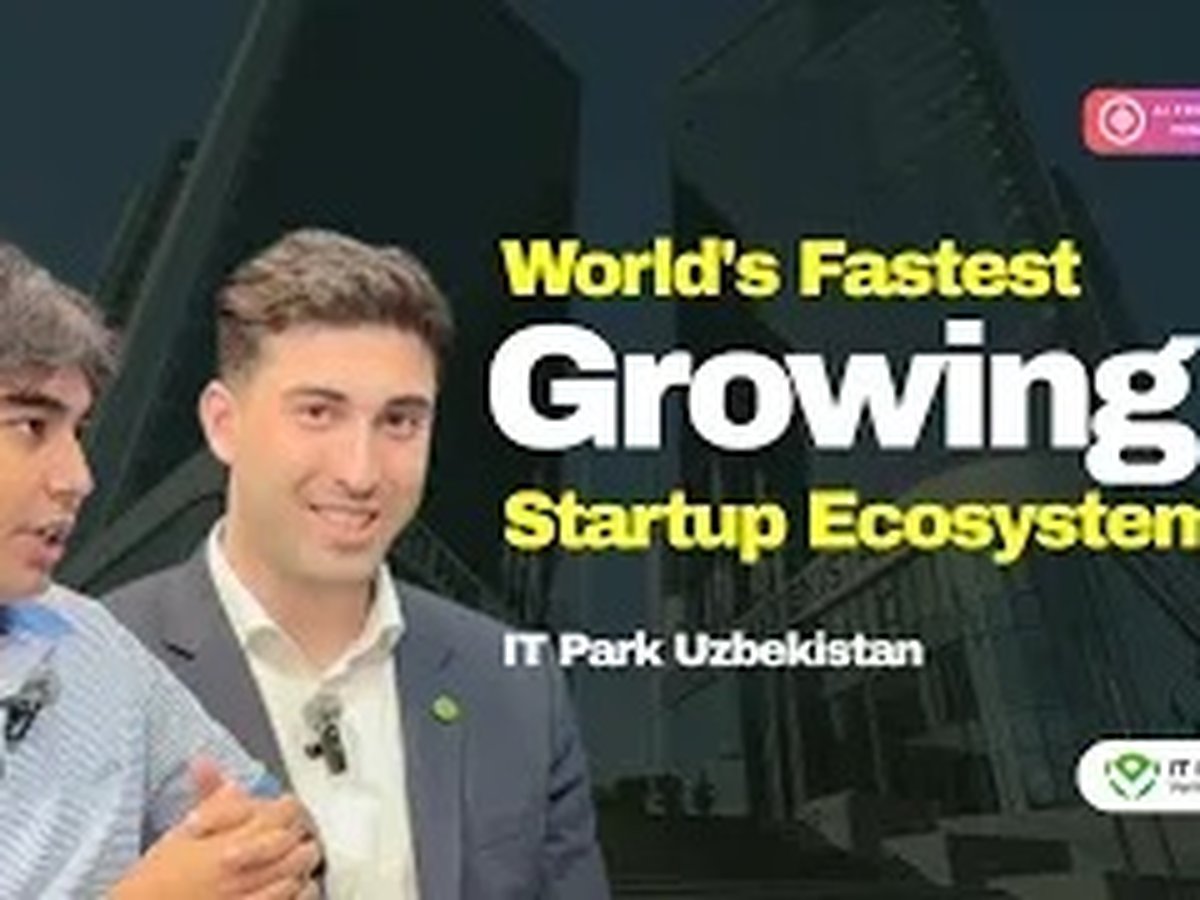 Two founders speaking in front of the IT Park Uzbekistan building in Tashkent
