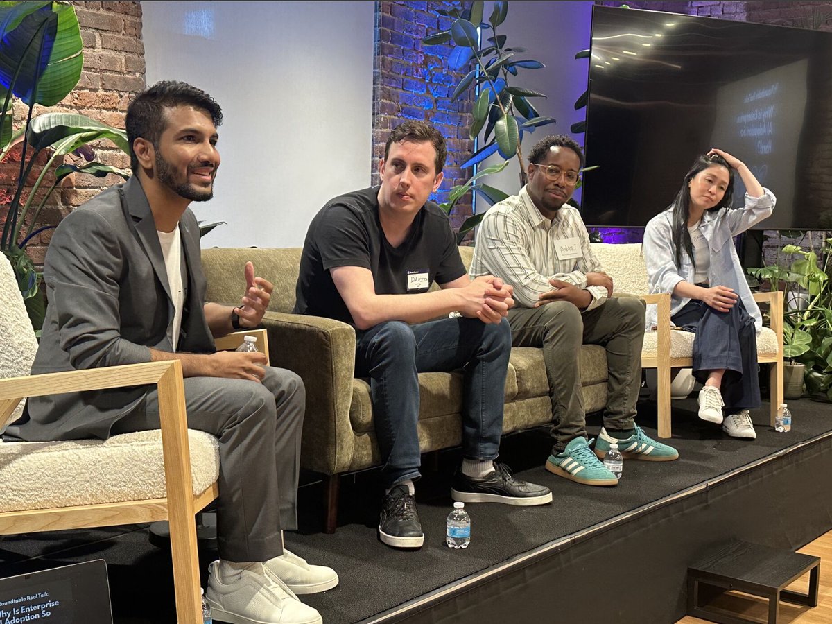 Panel discussion at the Executive AI Adoption Roundtable in New York, four panelists seated on stage at BrainStation SoHo